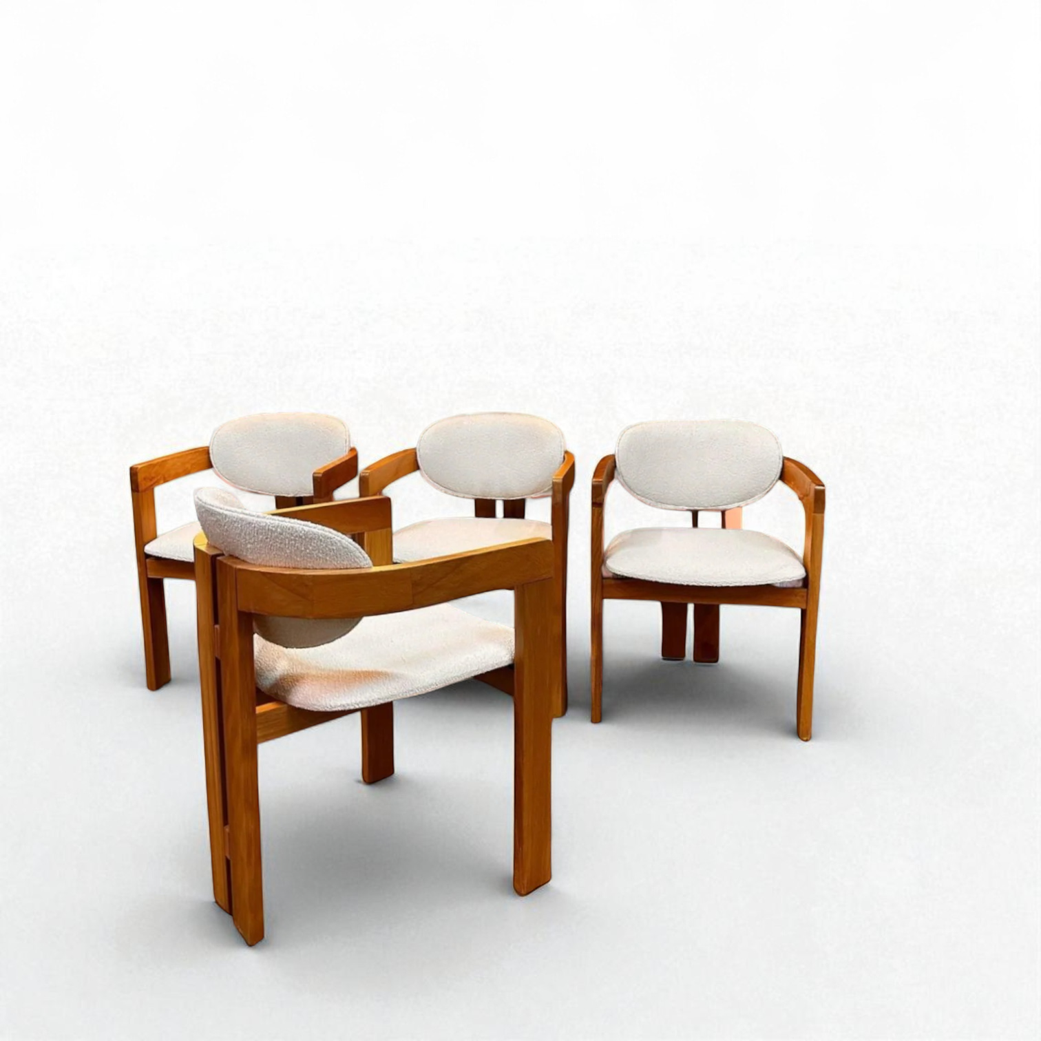 Comfortable Natural Dining Chair with Curved Design and Bouclé Upholstery