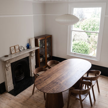 Cono Solid Walnut Oval Dining Table