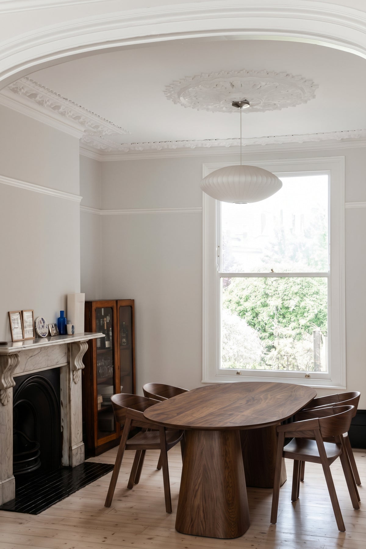 Cono Solid Walnut Oval Dining Table