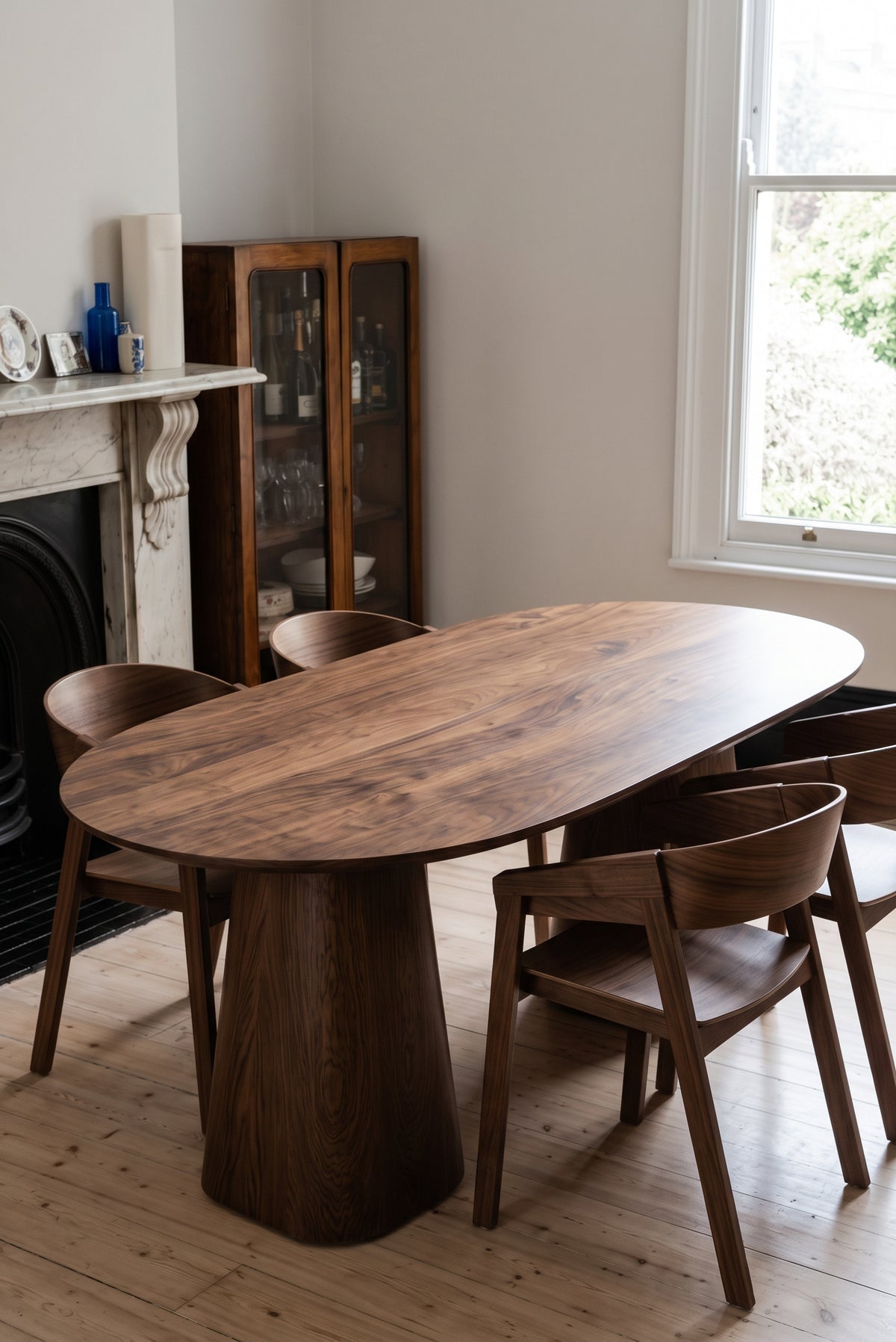 Cono Solid Walnut Oval Dining Table